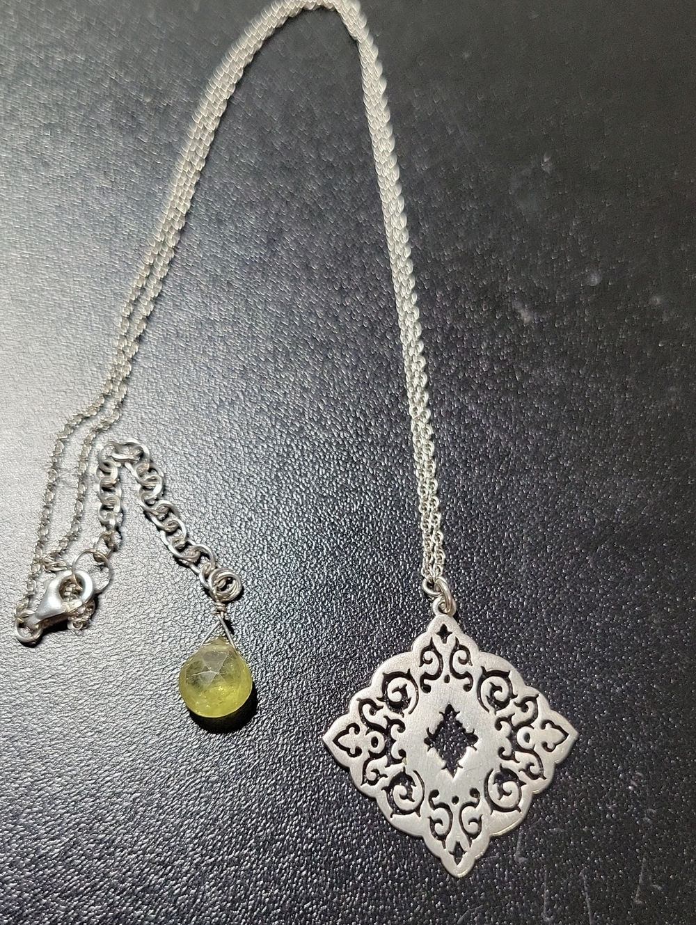 Silver Filigree Pendant Necklace with Green Accent